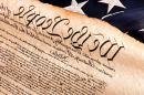 一张美国的照片.S. Constitution with a flag
